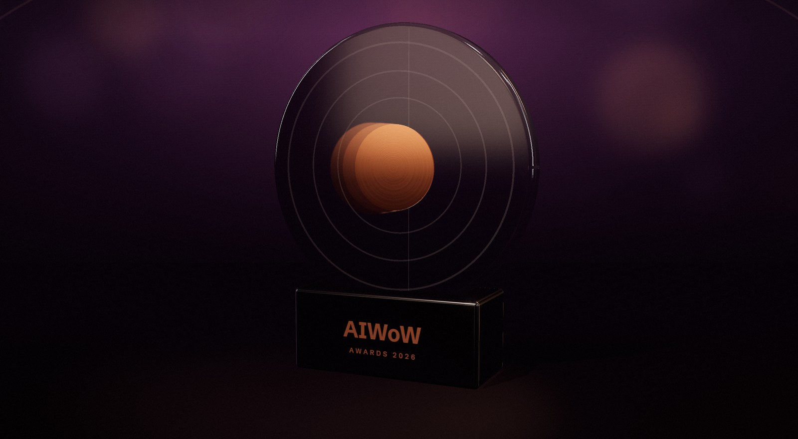 The AIWoW Award: a glass disc with a copper core on a black base engraved AIWoW Awards 2026